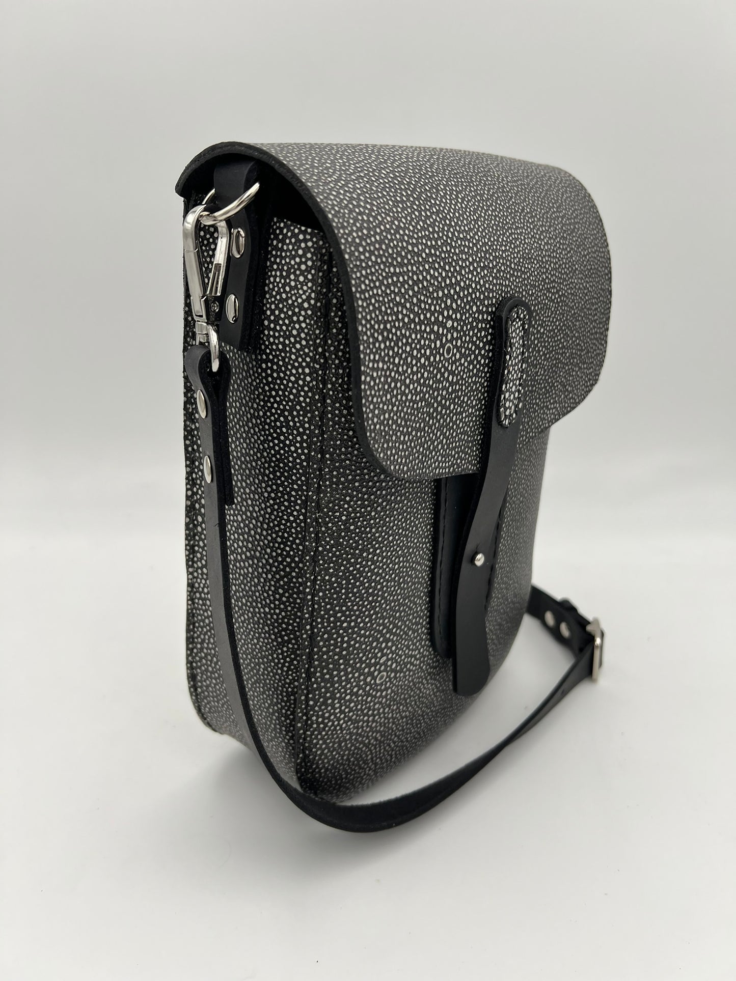 Crossbody satchel with embossed leather