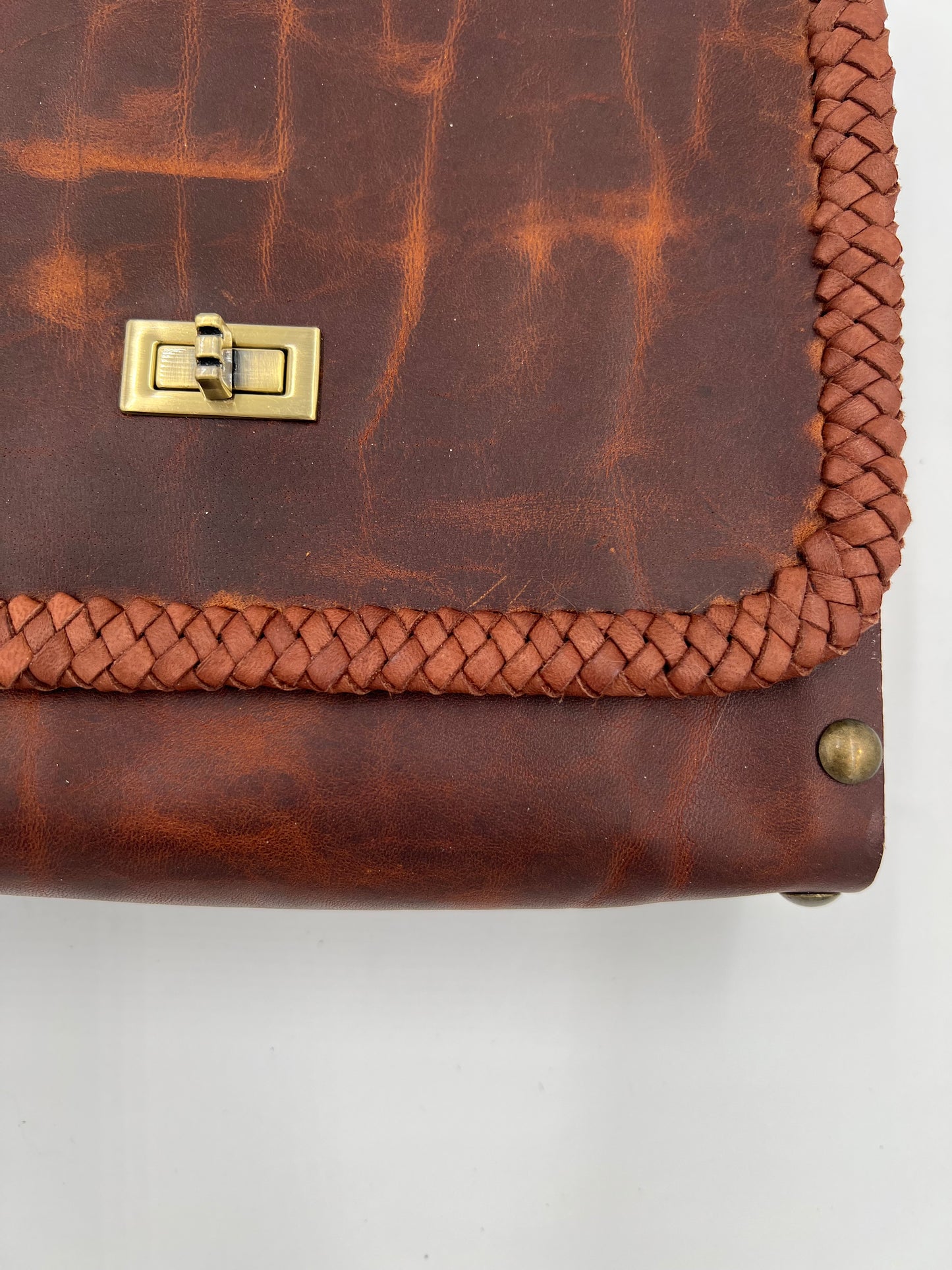Dark brown crazy horse leather bag with oak sides and lace detail