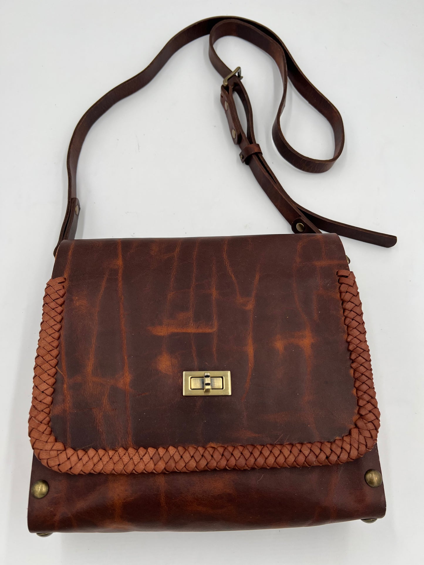 Dark brown crazy horse leather bag with oak sides and lace detail