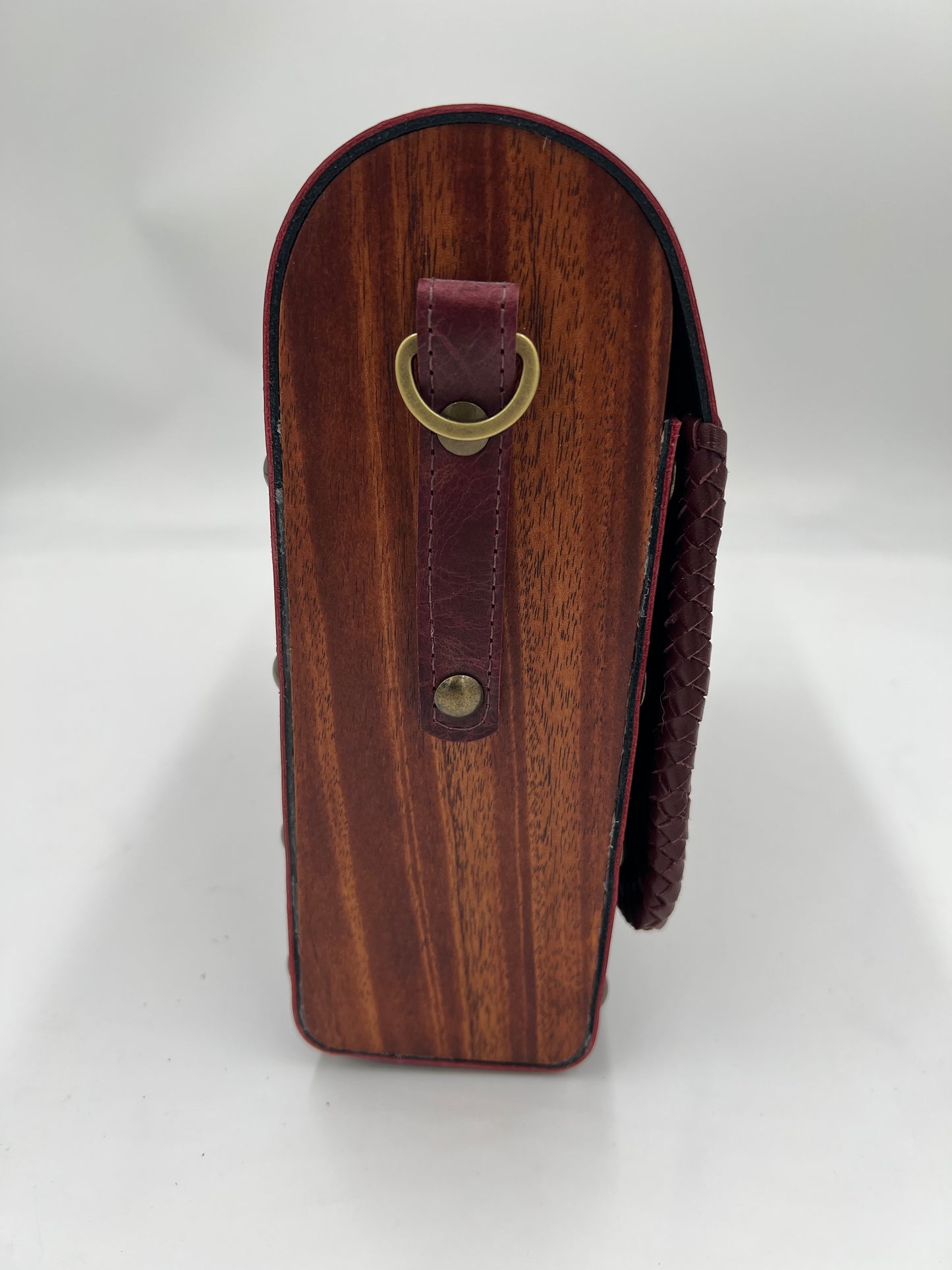 Burgundy vaquero leather bag with mahogany sides and lace detail