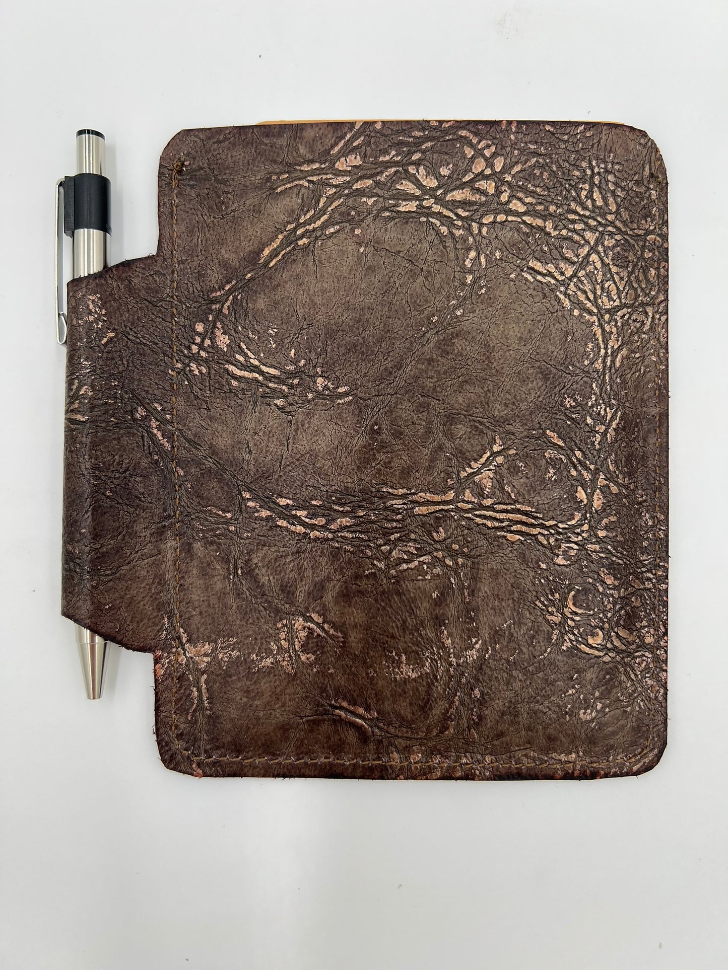 Handmade leather journal case with attached pen carrier