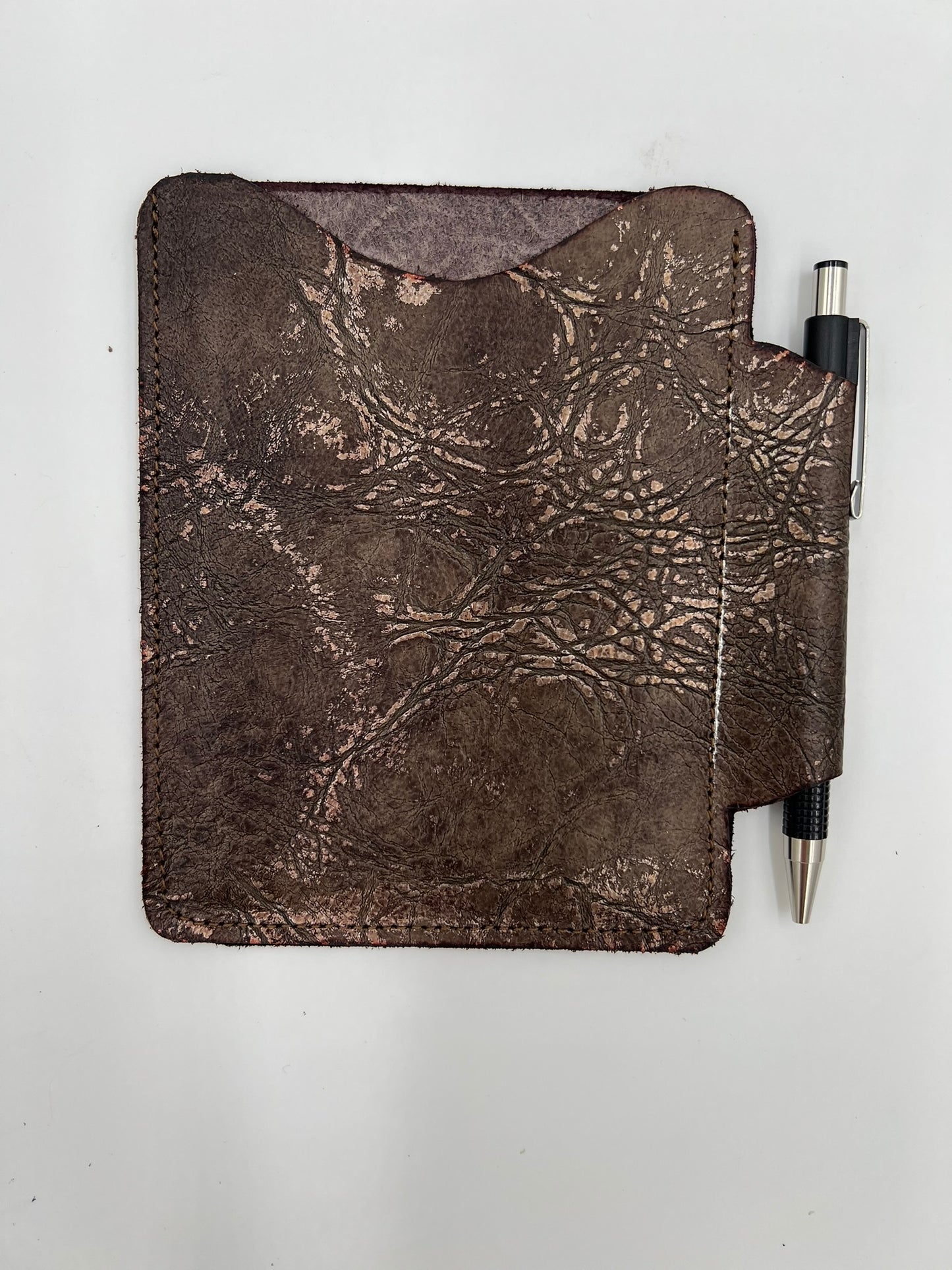Handmade leather journal case with attached pen carrier