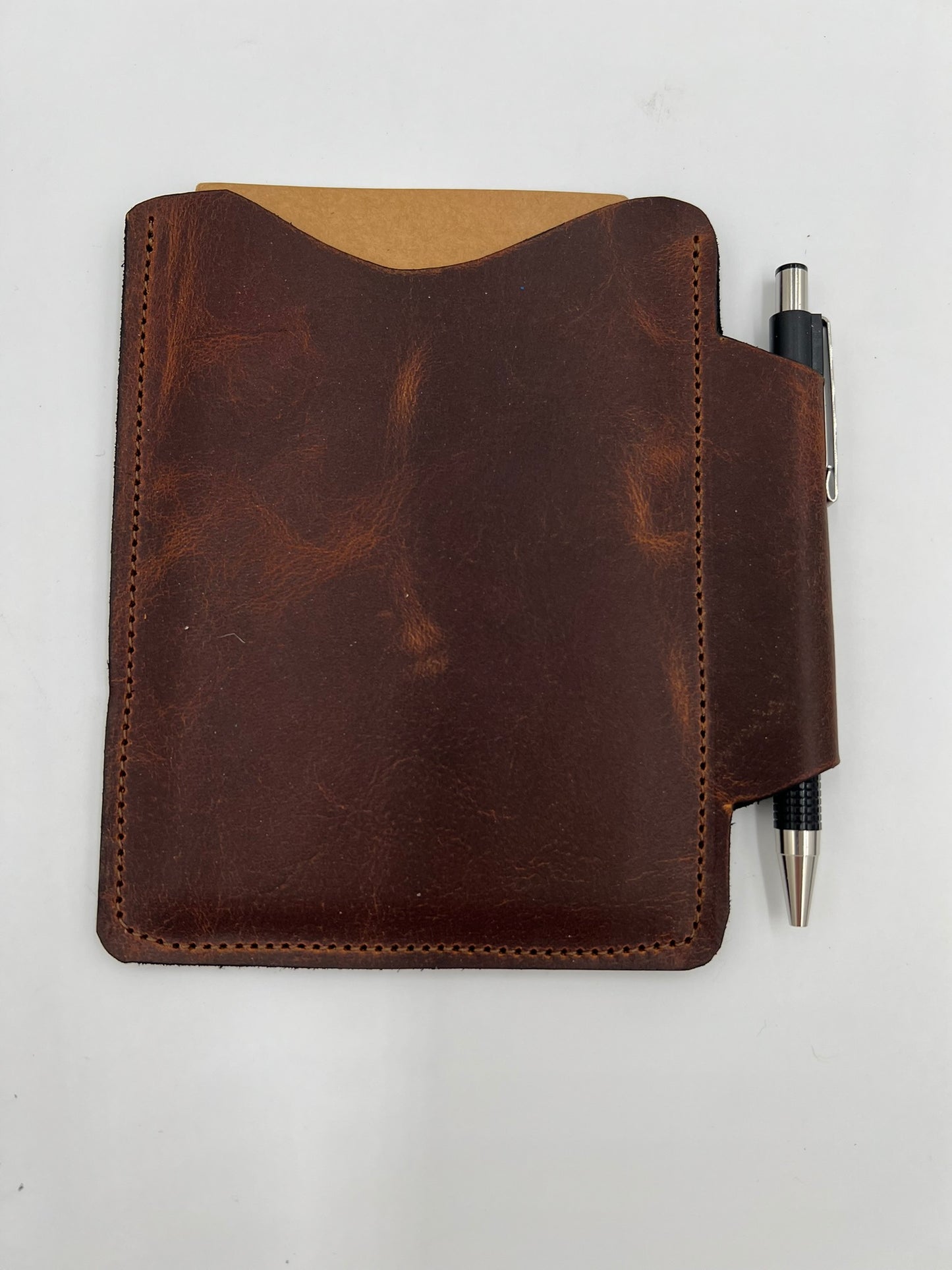 Handmade leather journal case with attached pen carrier
