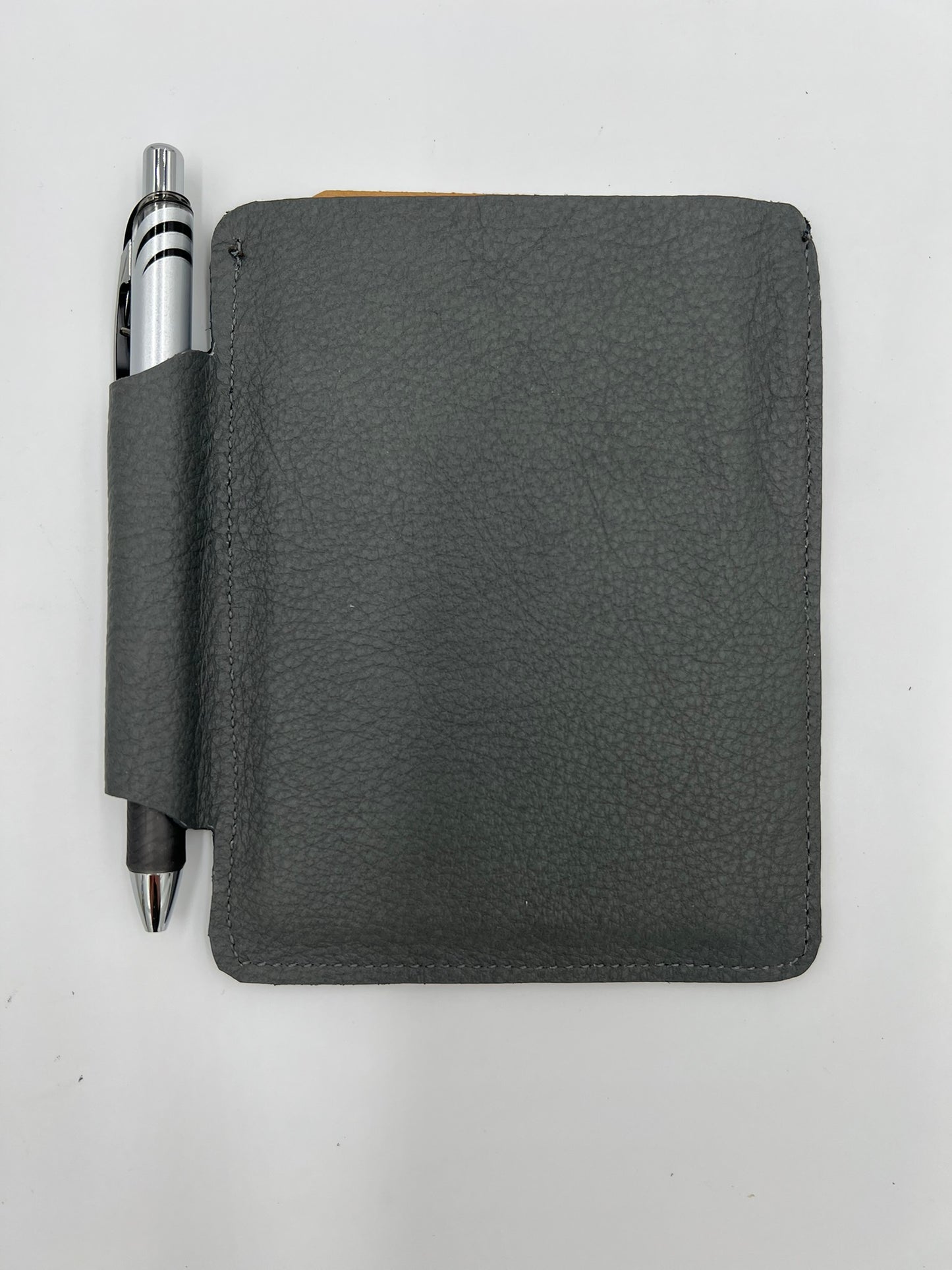 Handmade leather journal case with attached pen carrier