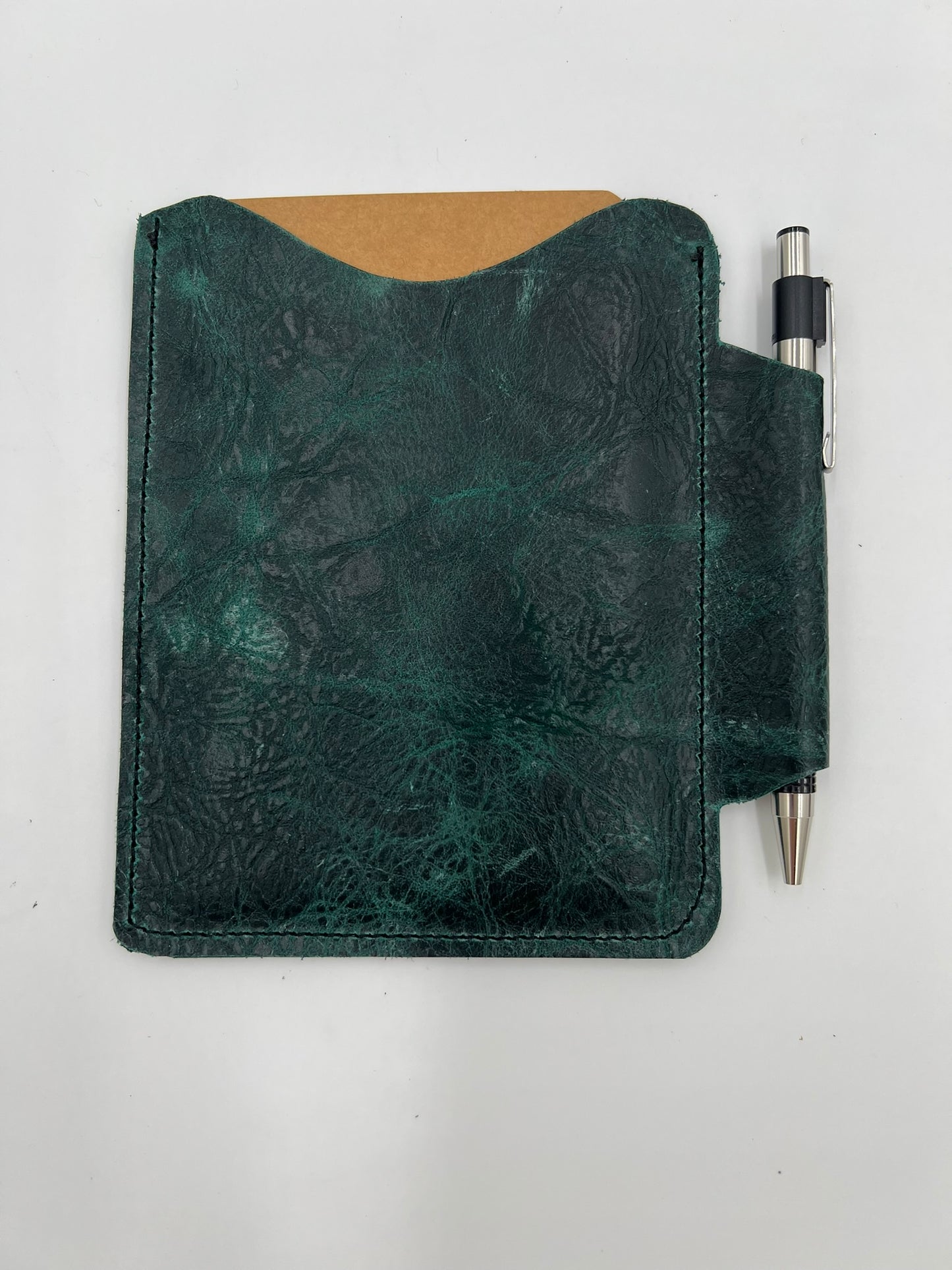 Handmade leather journal case with attached pen carrier