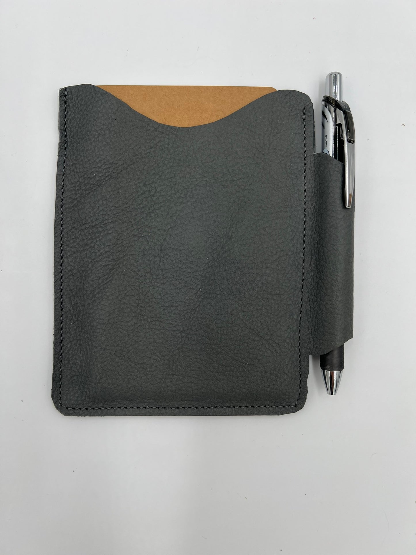 Handmade leather journal case with attached pen carrier