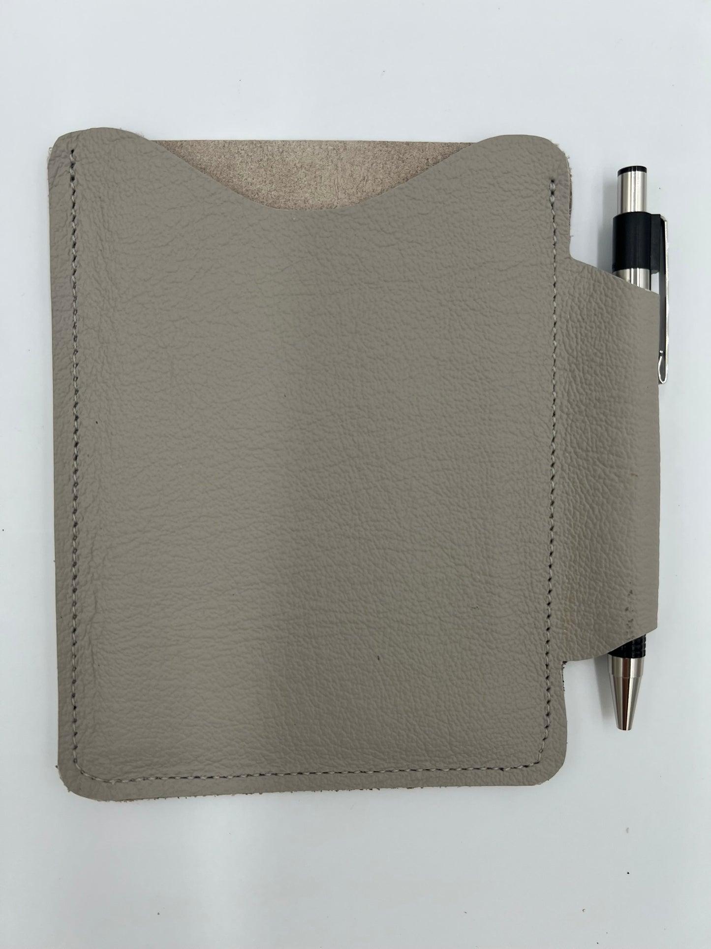 Handmade leather journal case with attached pen carrier