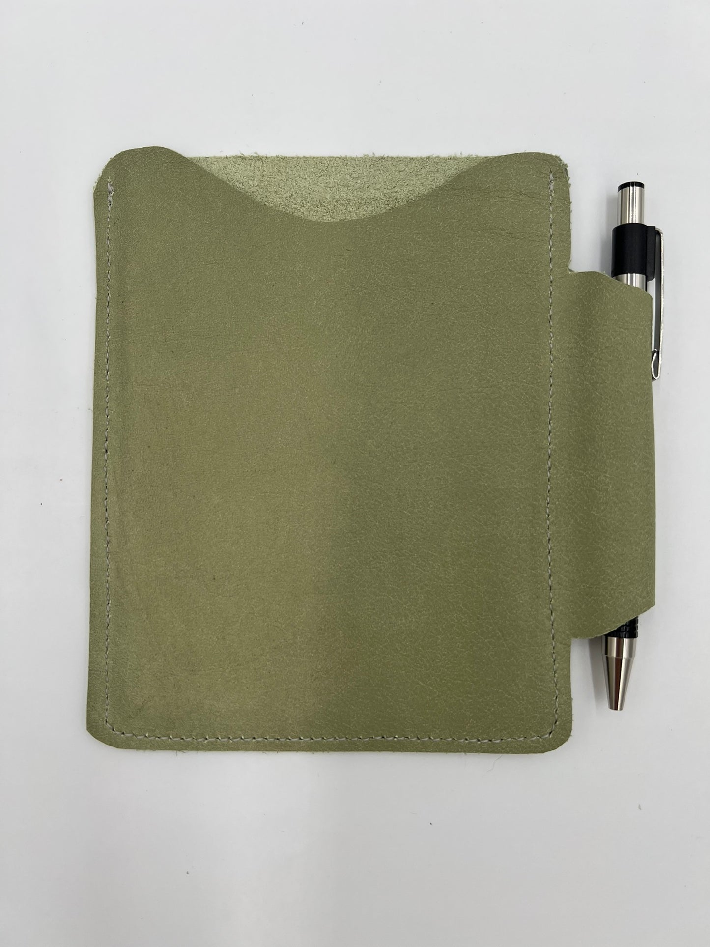 Handmade leather journal case with attached pen carrier