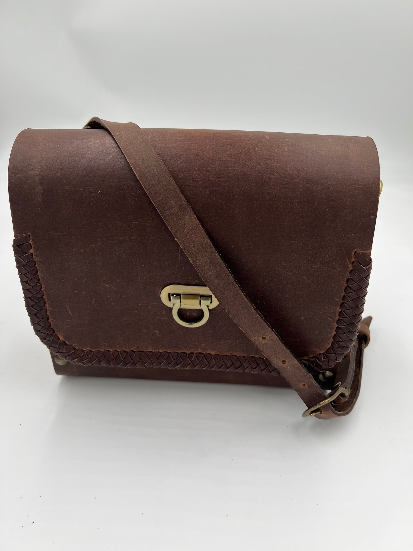 Designer leather and poplar wood crossbody bag with lace edging