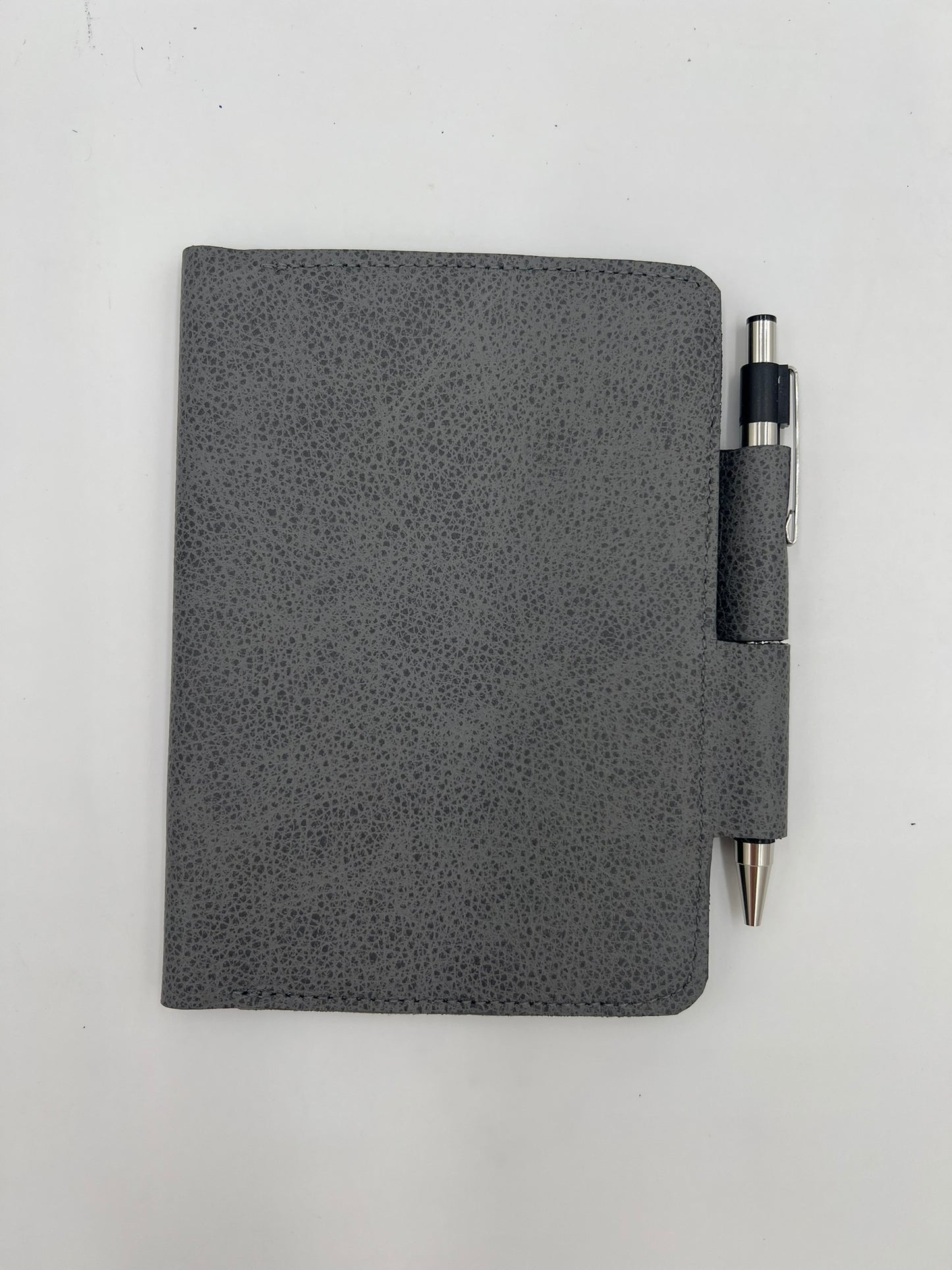 Handmade leather journal cover with card slot and pen holder