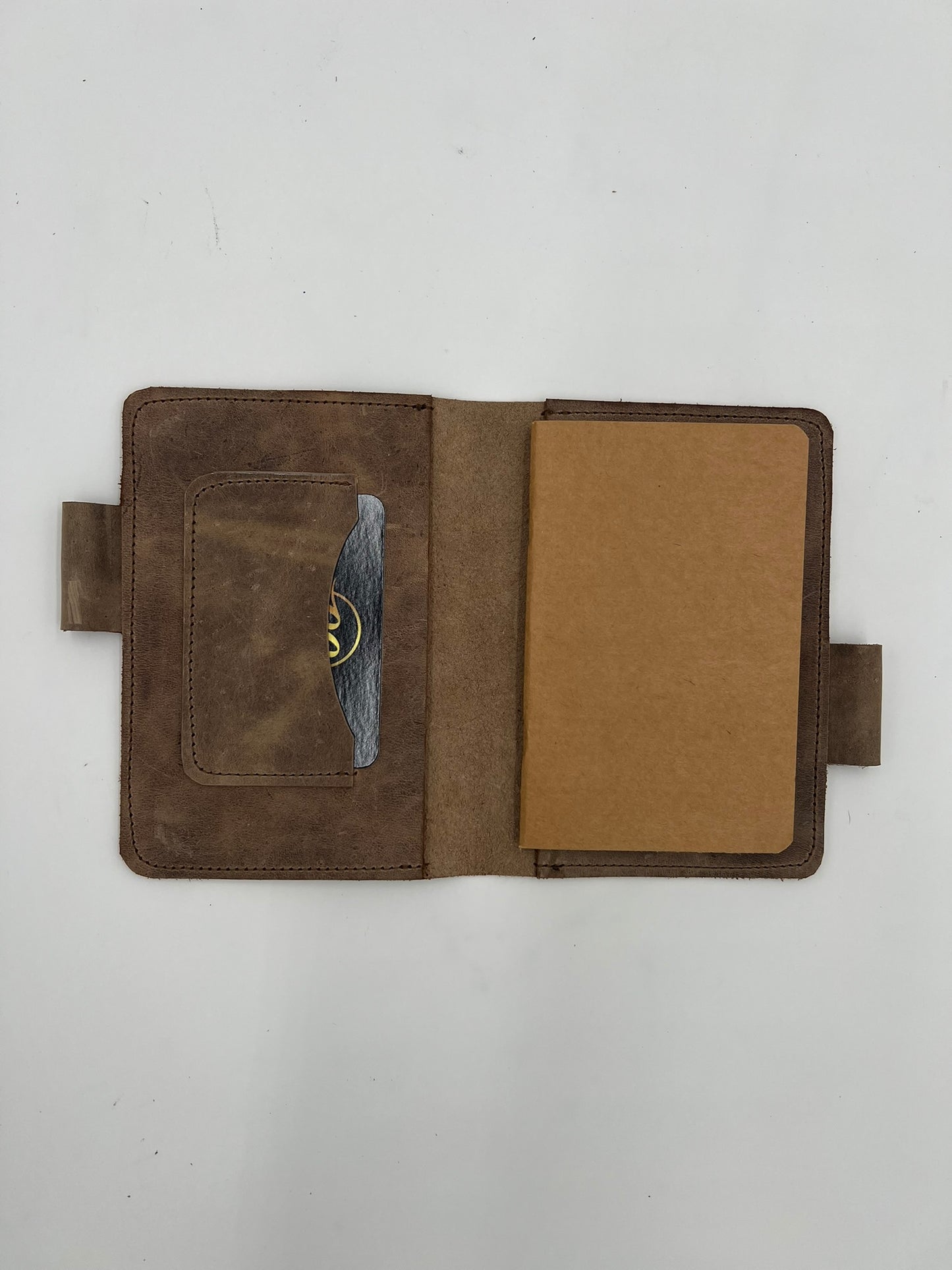 Handmade leather journal cover with card slot and pen holder