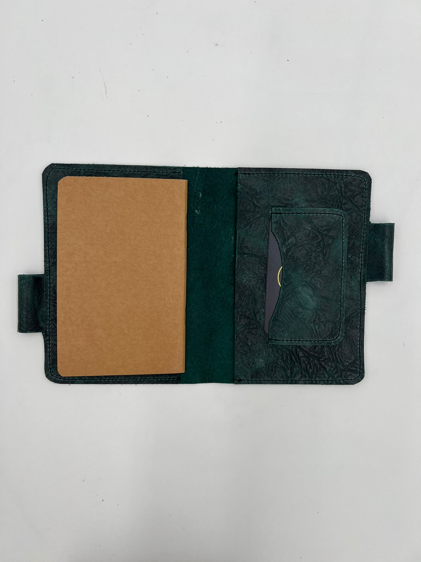 Handmade leather journal cover with card slot and pen holder