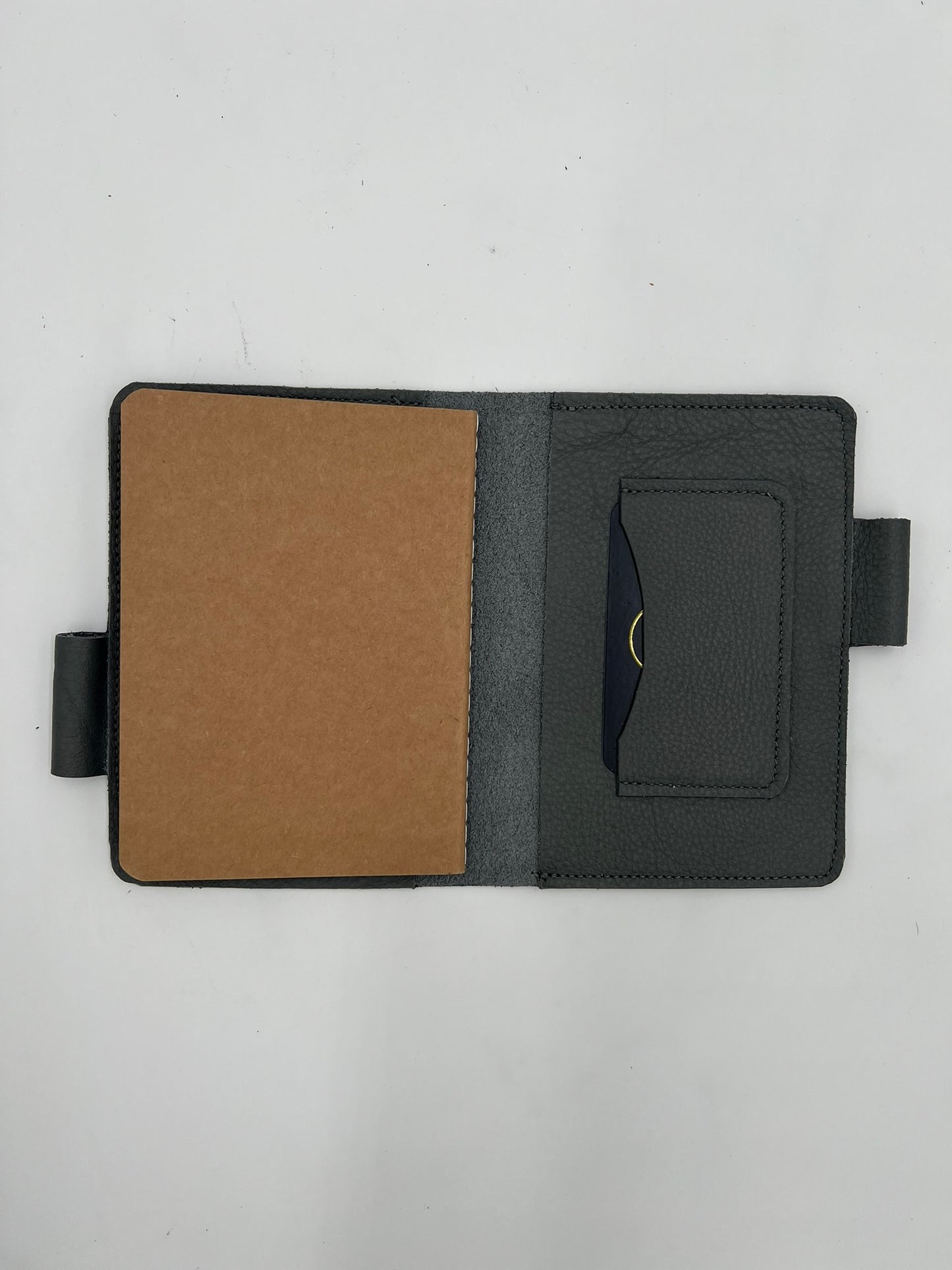 Handmade leather journal cover with card slot and pen holder