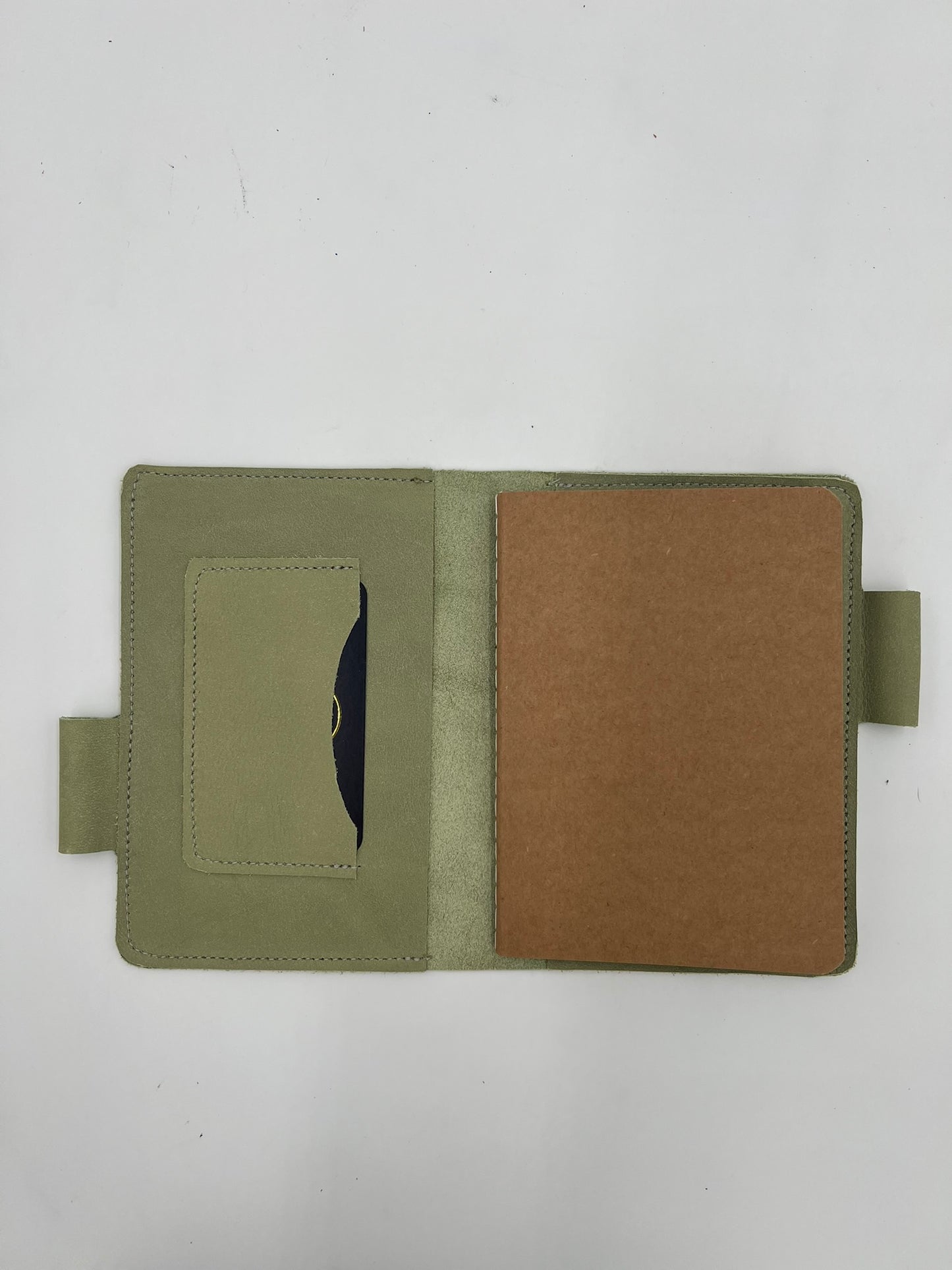 Handmade leather journal cover with card slot and pen holder