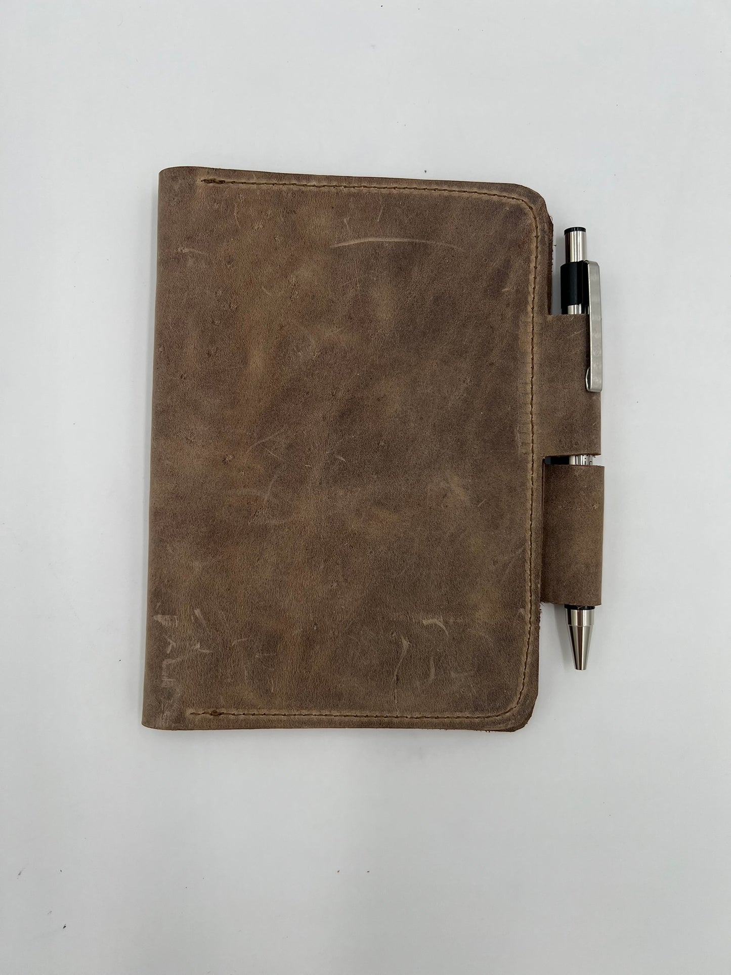 Handmade leather journal cover with card slot and pen holder