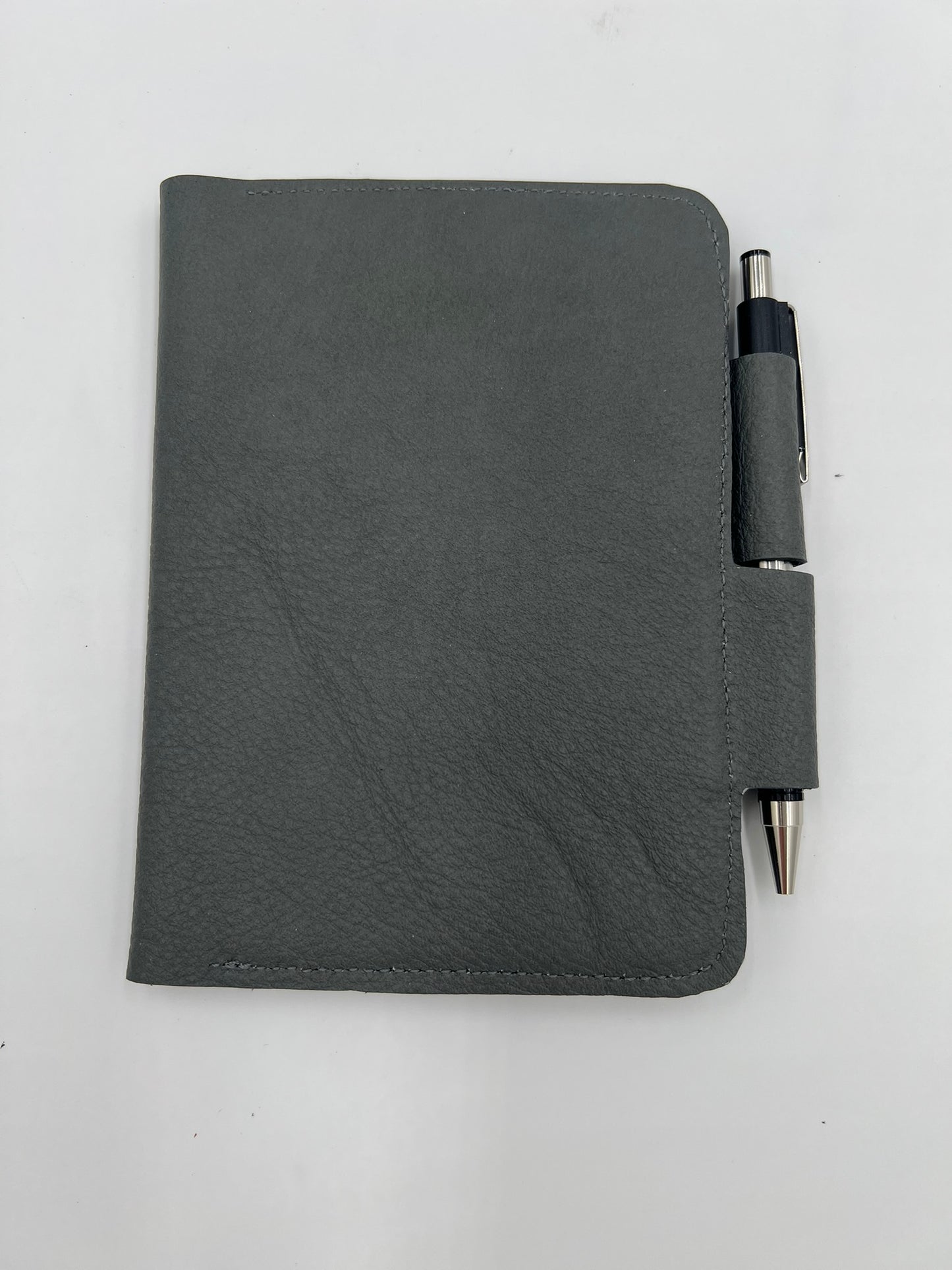 Handmade leather journal cover with card slot and pen holder