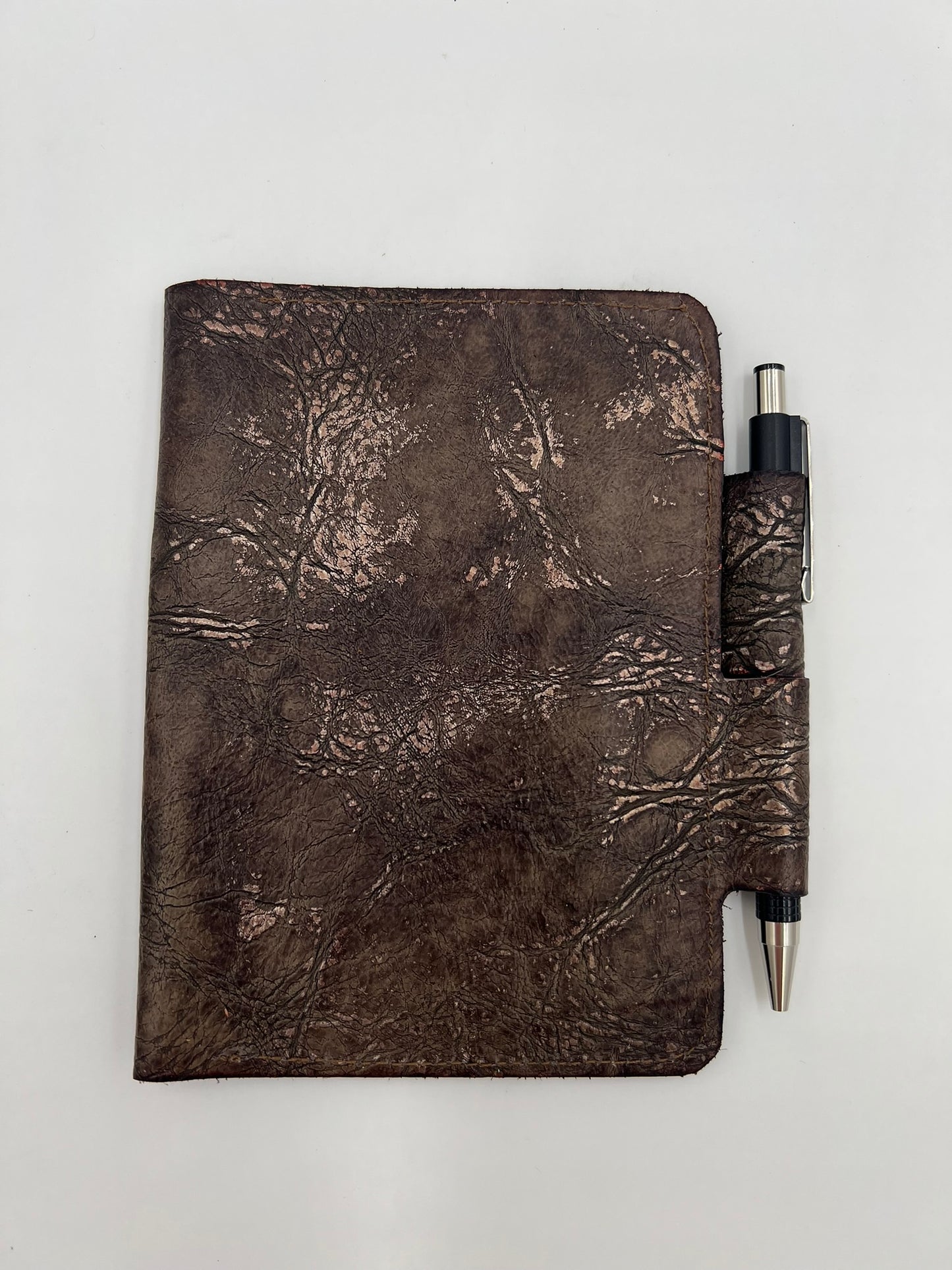 Handmade leather journal cover with card slot and pen holder