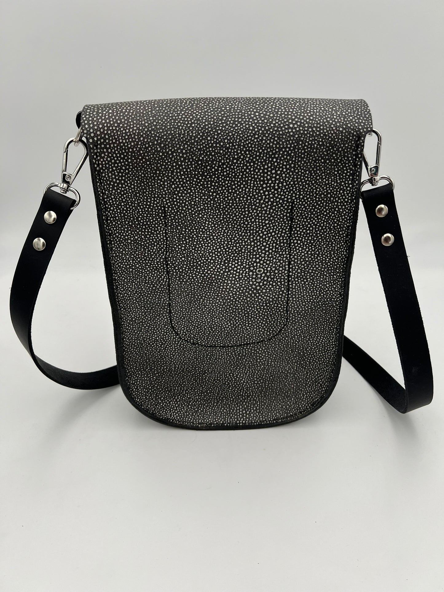 Crossbody satchel with embossed leather