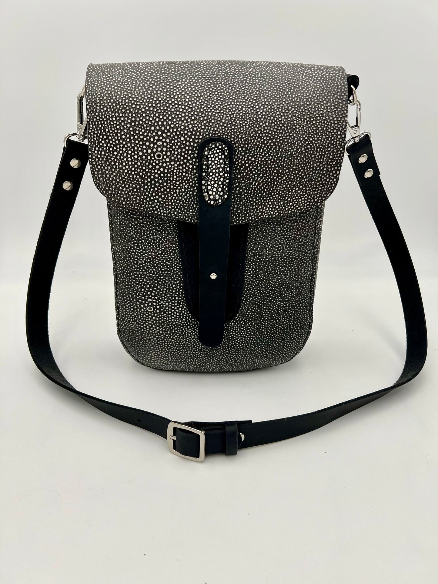 Crossbody satchel with embossed leather